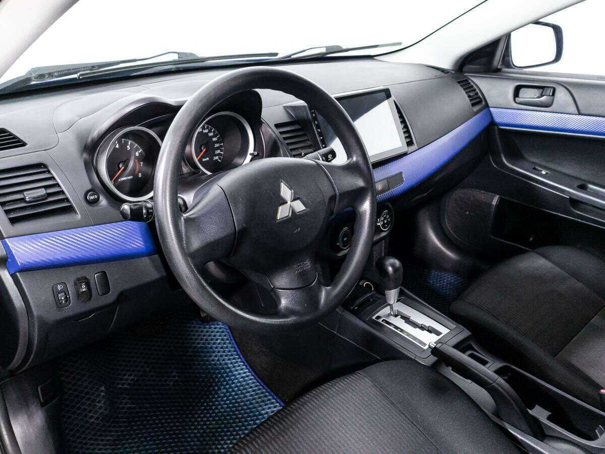 Mitsubishi Lancer с пробегом — 2012 год. Фото: #10