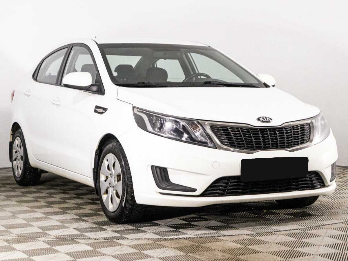 Kia Rio с пробегом — 2014 год. Фото: #2