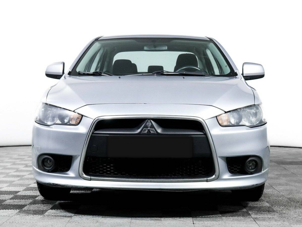 Mitsubishi Lancer с пробегом — 2014 год. Фото: #1