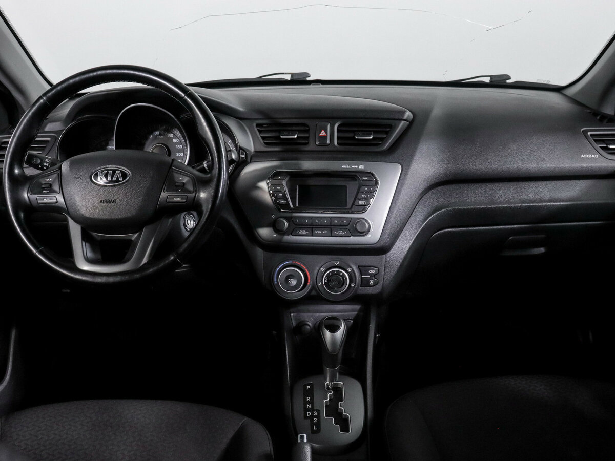 Kia Rio с пробегом — 2014 год. Фото: #9