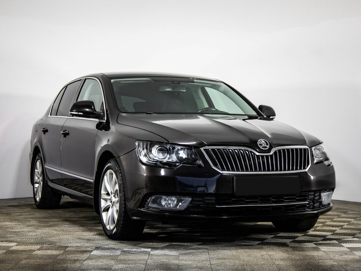 Skoda Superb с пробегом — 2014 год. Фото: #2