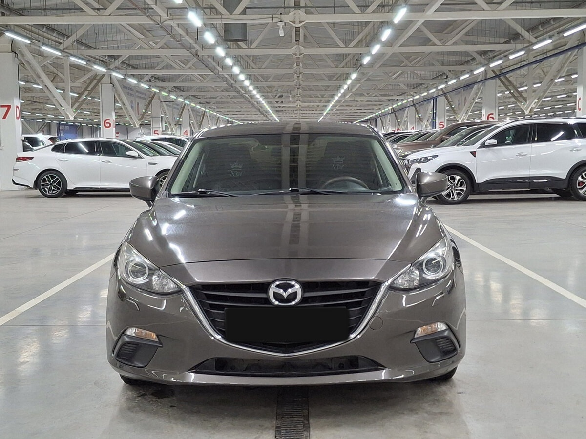 Mazda 3 с пробегом — 2014 год. Фото: #1