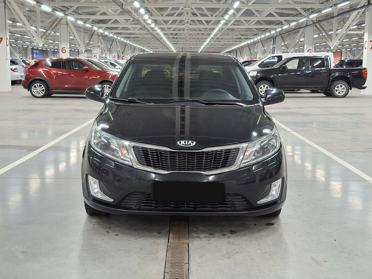 Kia Rio с пробегом — 2014 год. Фото: #1