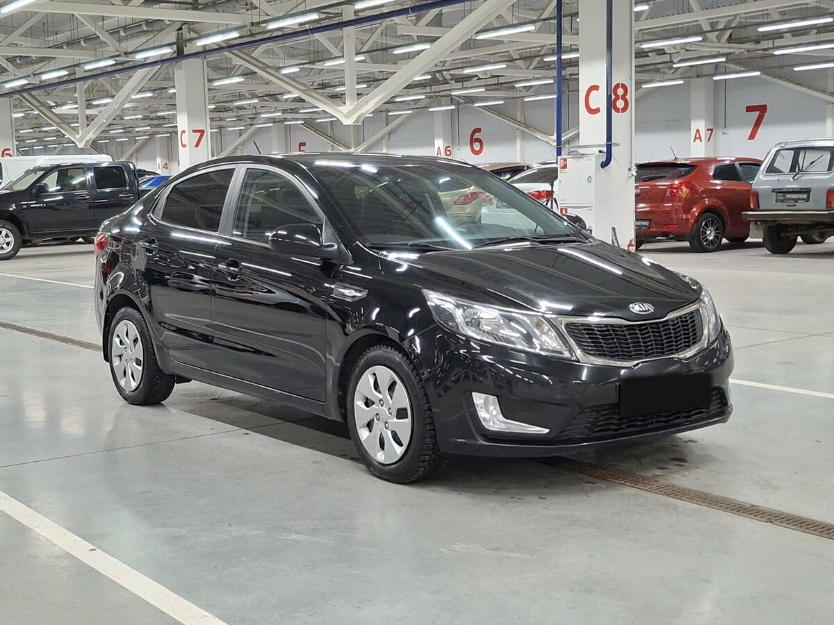Kia Rio с пробегом — 2014 год. Фото: #2