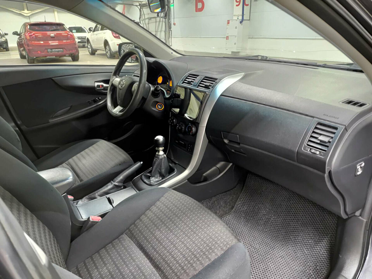 Toyota Corolla с пробегом — 2012 год. Фото: #10