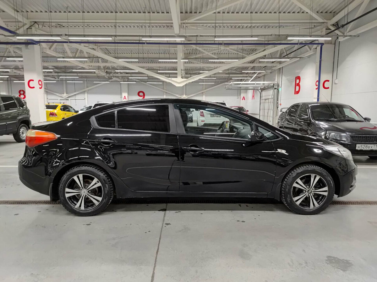 Kia Cerato с пробегом — 2013 год. Фото: #4