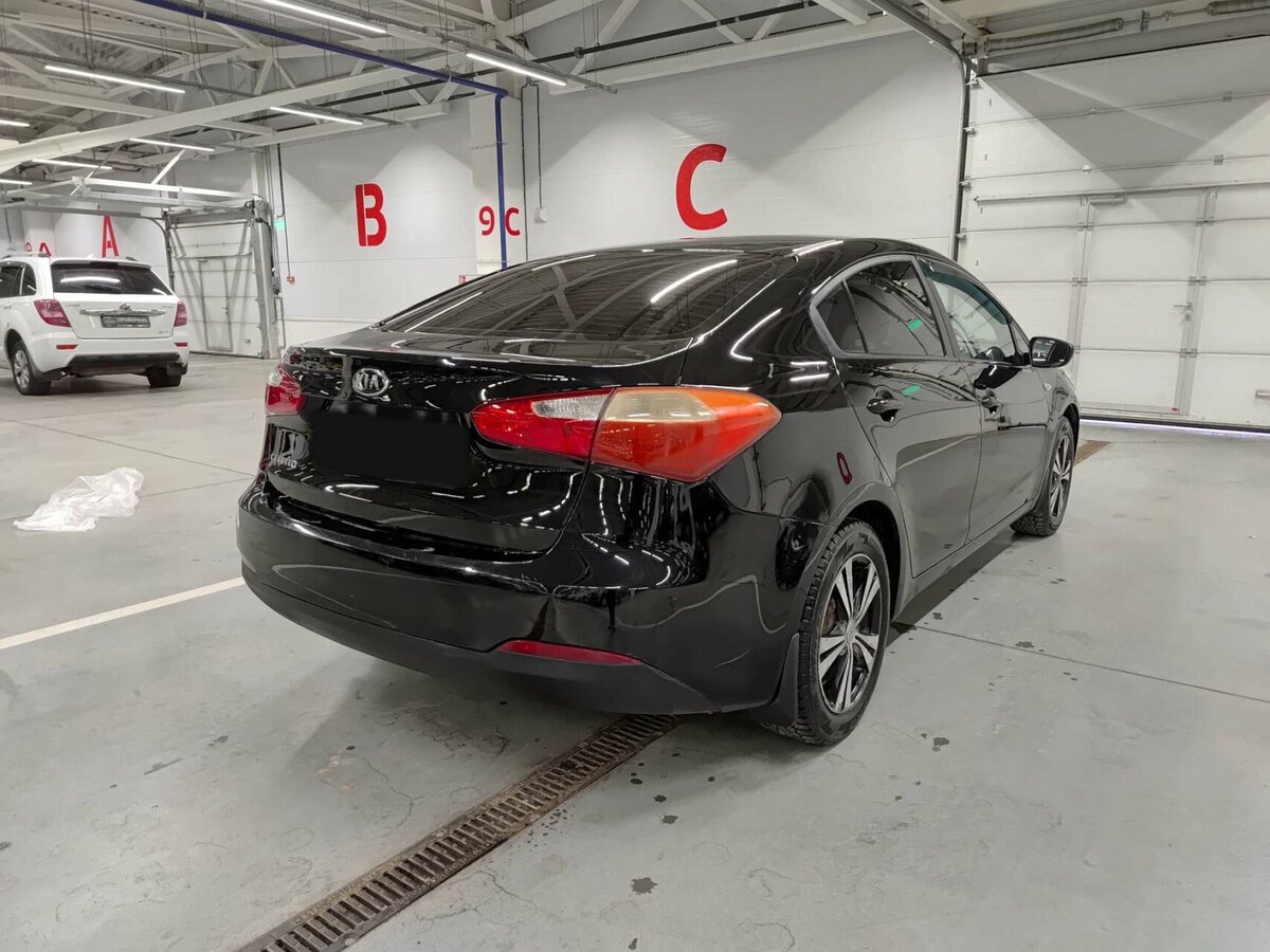 Kia Cerato с пробегом — 2013 год. Фото: #5