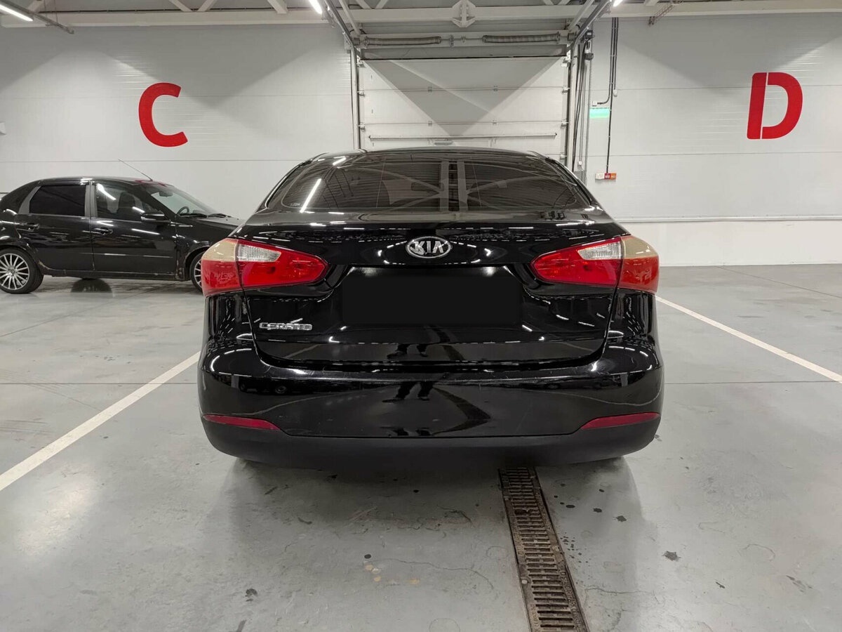 Kia Cerato с пробегом — 2013 год. Фото: #6