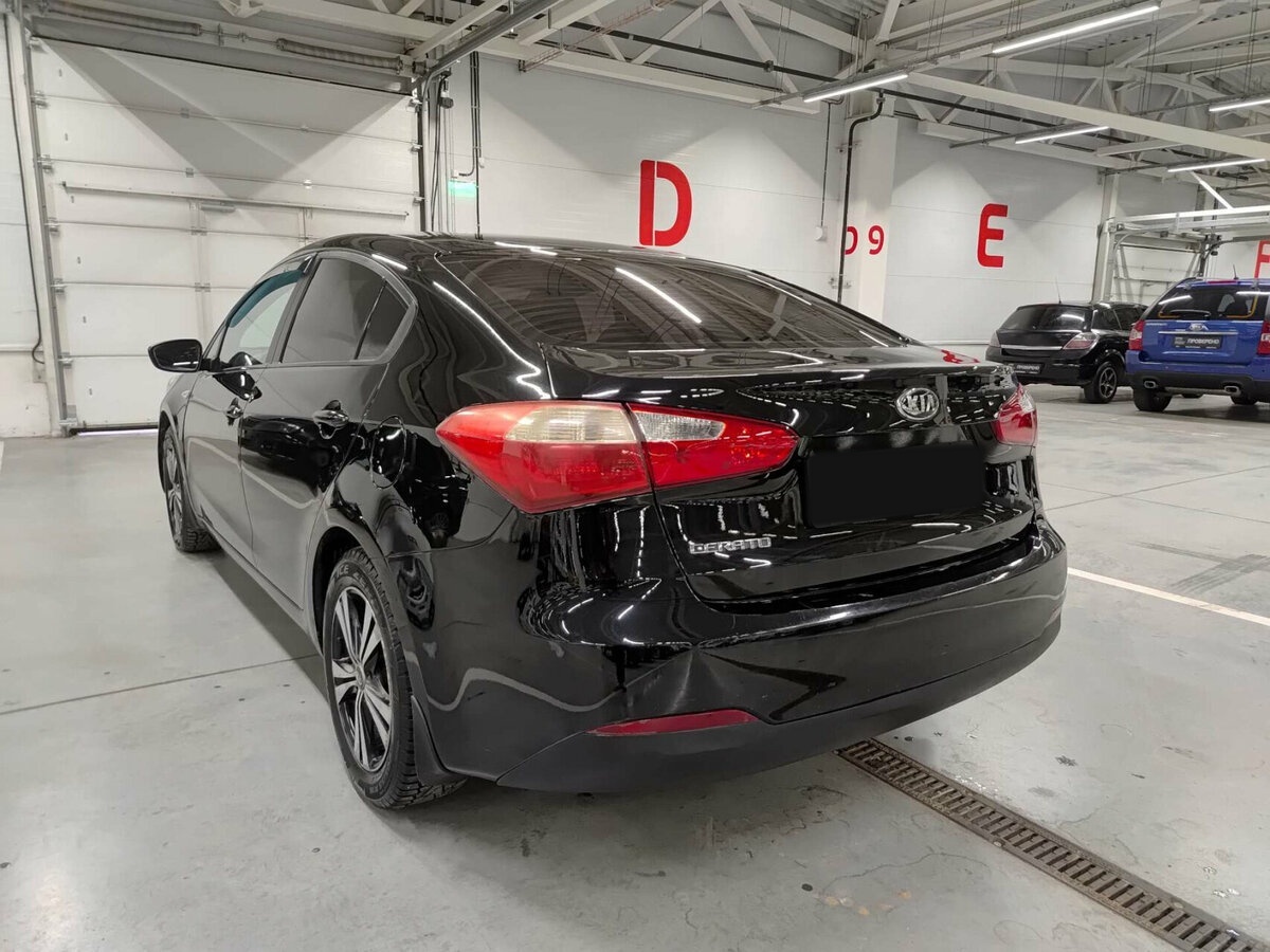 Kia Cerato с пробегом — 2013 год. Фото: #7