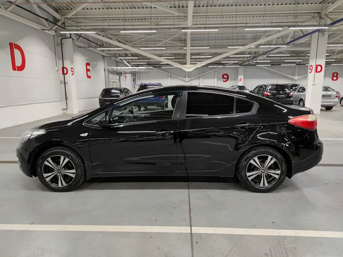 Kia Cerato с пробегом — 2013 год. Фото: #9