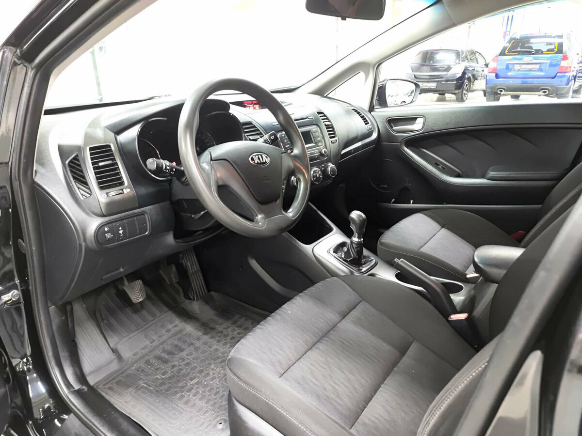 Kia Cerato с пробегом — 2013 год. Фото: #19