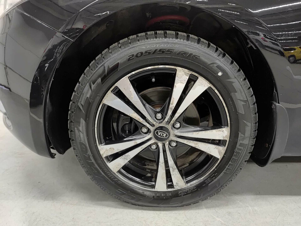 Kia Cerato с пробегом — 2013 год. Фото: #21